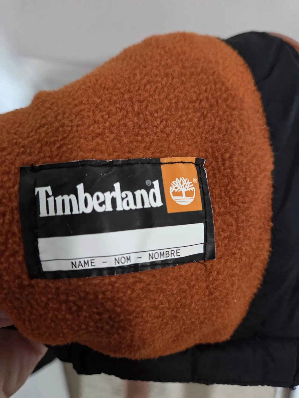 Timberland Kids' Black Puffer Jacket with Orange Lining
